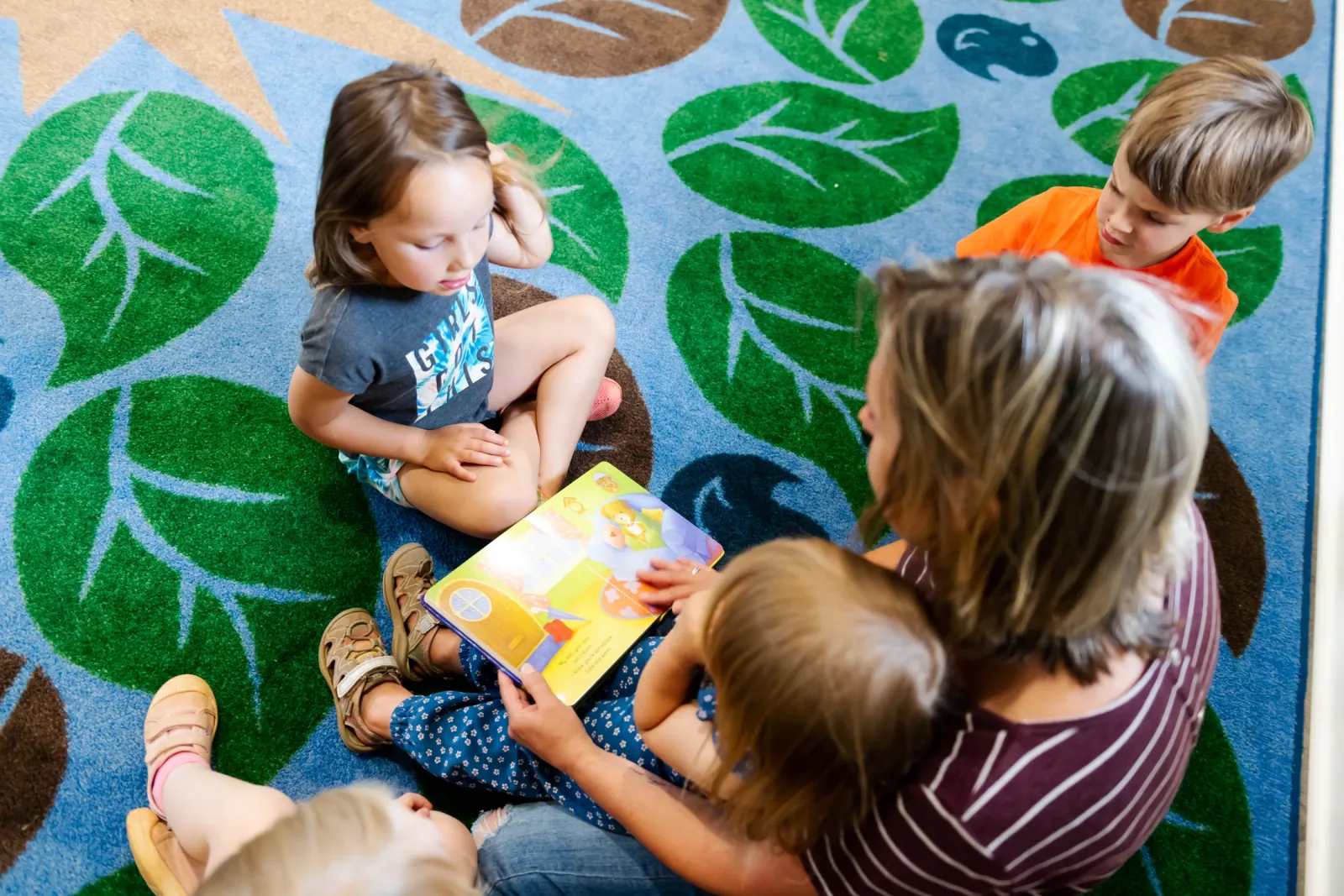 A young child participating in an early learning activity